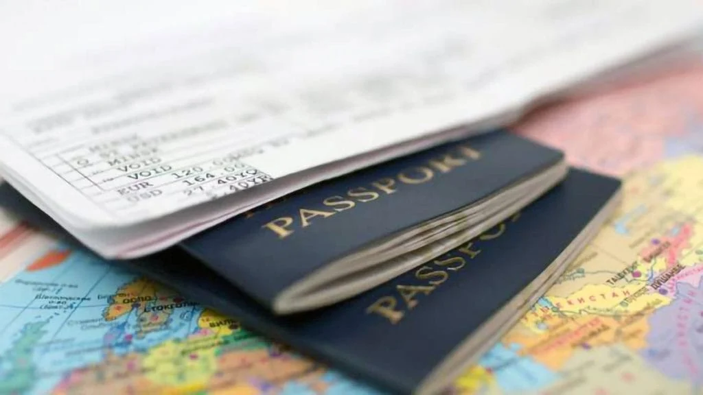 Passports and travel documents on a world map